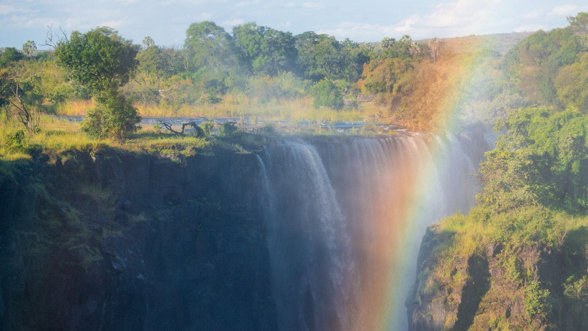Lush landscape and waterfalls in Africa Samuel Roy - Arkel's Ambassador